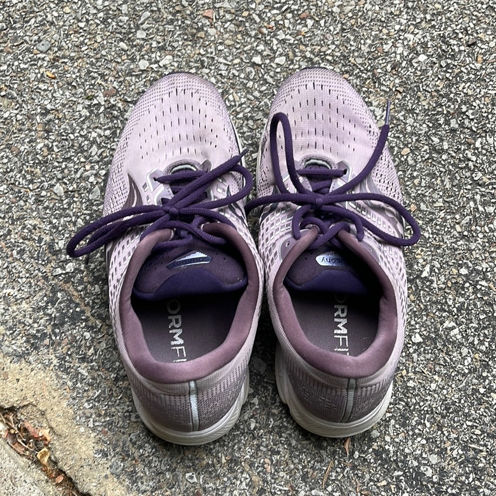 Well worn purple Saucony sneakers